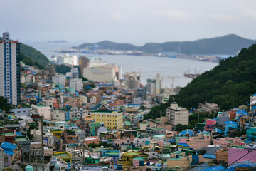 Panoramic view of coastal city Busan with ocean and port