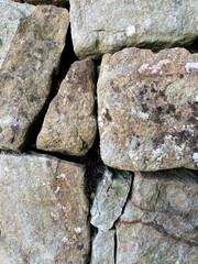Naturstein-Mauer als Textur oder Hintergrundbild