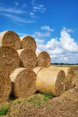 Hay bales against the sky.