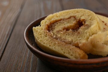 Homemade Cinnamon Roll Cake on Rustic Wooden Table - Cozy, Delicious, Baked Delight