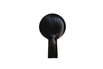Back view of woman with ponytail through keyhole isolated on black