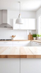 Blurred modern white kitchen with wooden countertop