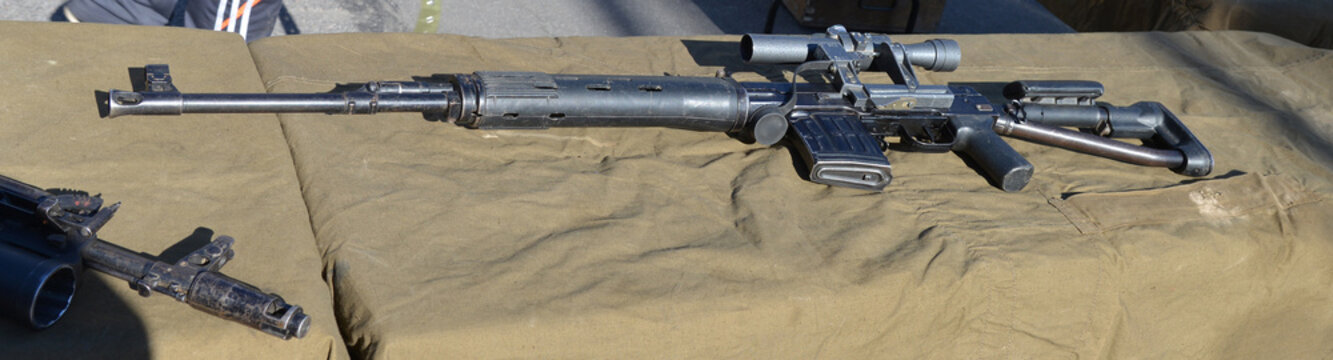The Dragunov sniper rifle (SVD) on a green background