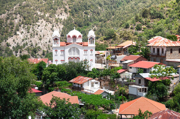 Pedoulas village featuring its magnificent church and traditional houses in Cyprus, Nicosia District
