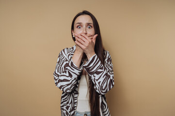 Surprised Woman Covering Mouth in Shock