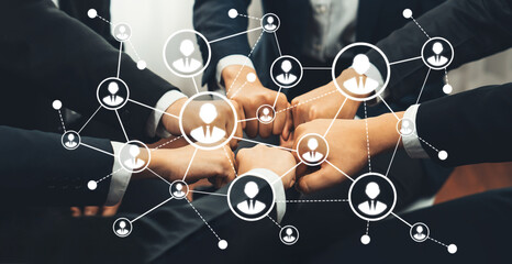 Office worker team stacking hand together symbolize successful group of business partnership and strong collective unity teamwork in community workplace in panoramic banner. Shrewd Amity