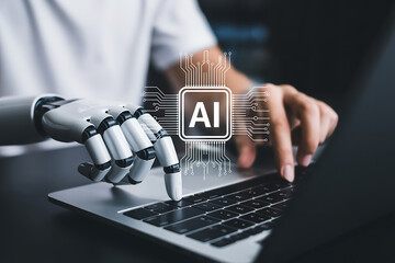 Human and Robotic Hand Collaboration on Laptop Keyboard with AI Circuit Overlay Representing Machine Learning and Digital Synergy