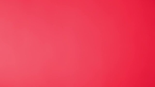 Pink red background. Light peach color backdrop. Pastel tint. Luxury mockup design. Painted OSB wallpaper. Copy space. Soft light gradient. Warm mono colour. No people. Empty vintage wall. 4k footage.
