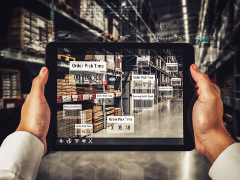 Smart warehouse management system using augmented reality technology to identify package picking and delivery . Future concept of supply chain and logistic business . - Powered by Adobe