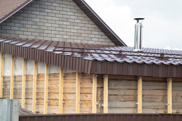 Metal tile.Roof for the house. Modern coatings for the roof of the house.