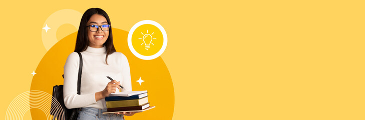 A student stands confidently against a yellow background, holding textbooks and a notebook. She...