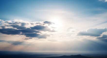 Obraz premium Sky with clouds and sun over the landscape.