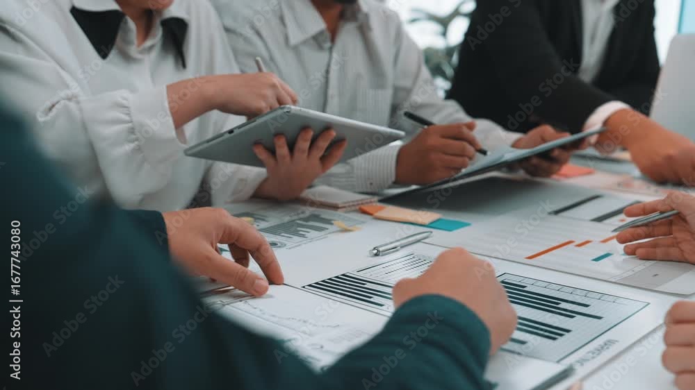 Aufkleber a diverse business team engages in a collaborative meeting, analyzing data and strategizing on proje