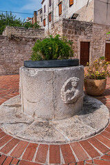 During the Middle Ages, the "Four Wells" cistern was constructed in Sibenik to address water shortages during military blockades and dry periods. Sibenik, Croatia.