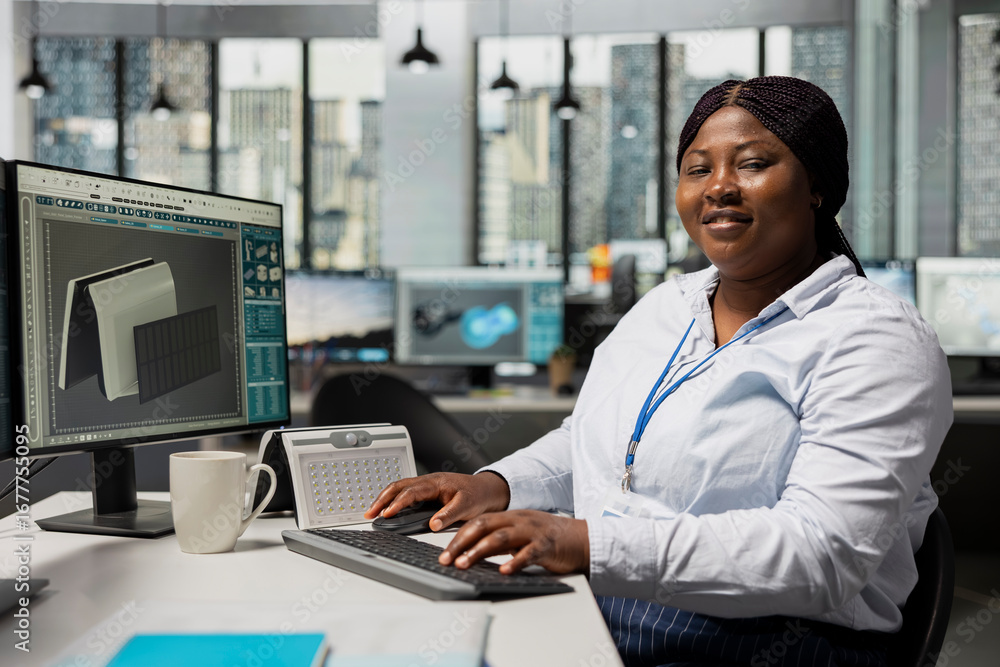 Poster portrait of smiling product designer in office creating solar device for clean energy projects. chee