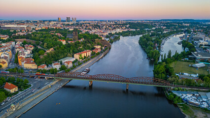Fototapeta premium Sunset view of Vysehrad behind vyton bridge in Prague, Czech rep