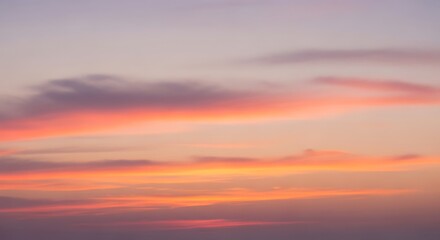 Vibrant Sunset Sky with Streaky Clouds.