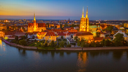 Fototapeta premium Sunset view of church of the Holy Cross and St Bartholomew and c