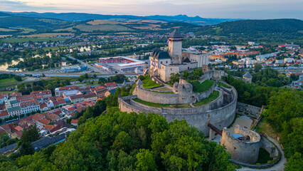 Sunset with Trencin castle overlooking the old town, Slovakia © dudlajzov
