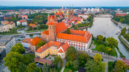 Naklejka premium Sunset view of center of Wroclaw with Roman Catholic parish chur