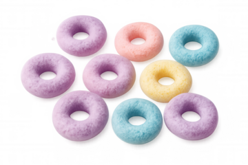 Ten colorful cereal rings are arranged on a transparent background, forming an interesting and visually appealing pattern