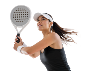 Focused female padel player in visor swinging racket on isolated transparent background
