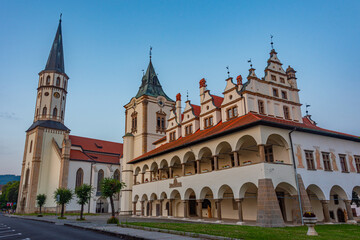Fototapeta premium Sunset view of the town hall and Basilica of St. James in levoca