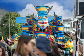 Loei, Thailand - July 6 2025  Phi Ta Khon festival Ghost mask and colorful costume Fun Traditional...