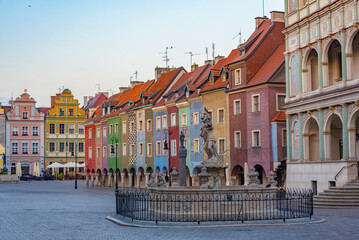 Fototapeta premium sunrise view of Proserpine Fountain and colourful houses at Star