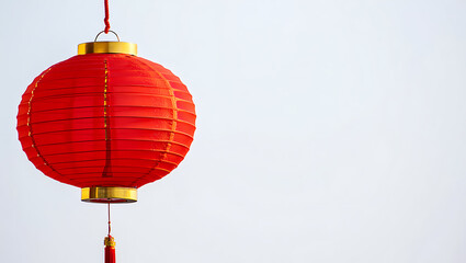 Obraz premium Festive Red Chinese Lantern Against White Background