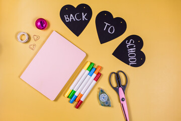Back to school concept, flat lay of vibrant school or office colorful supplies, school stationery on pink background. flat lay, top view