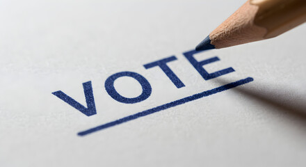Close-up of a pencil underlining the word 'VOTE' on paper, symbolizing elections, choice, and democratic participation.
