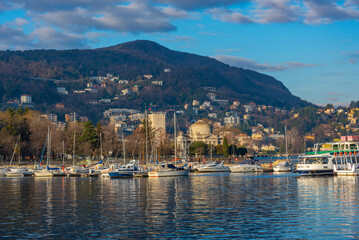 Fototapeta premium Sunrise view of marina in Italian town Como