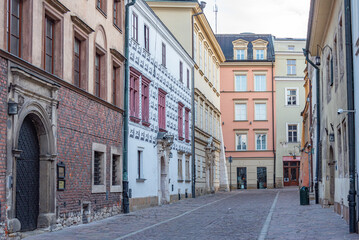 Obraz premium Narrow street in the historical center of Krakow, Poland