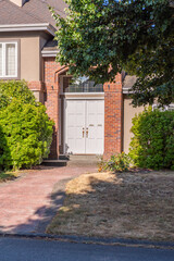 Entrance of luxury house in summer with nice landscape in Vancouver, Canada, North America. Day...