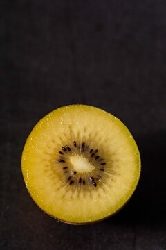 Golden kiwi sliced in half 