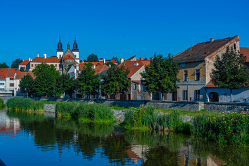Obraz premium Riverside of Jihlava and Saint Prokop basilica in Trebic in Czec