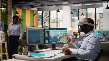 Engineer using virtual reality simulation to do clean energy production technology testing. Man wearing VR headset does R and D of cutting edge solutions in renewable energy sector, camera A - Powered by Adobe