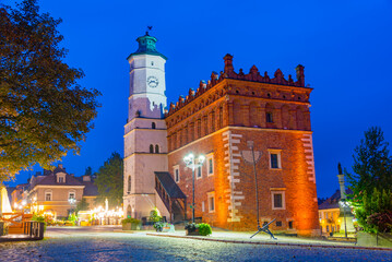 Obraz premium Sunset view of town hall at Rynek square in Sandomierz, Poland