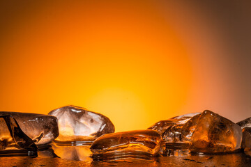 colored natural ice for podium background.real ice with texture for presentation of cosmetics...