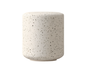 Light beige speckled cylinder-shaped decorative object.