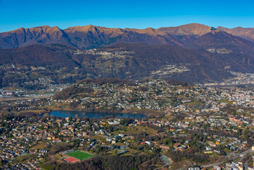 Panorama of Alps viewed behind Lugano from Monte San Giorgio in