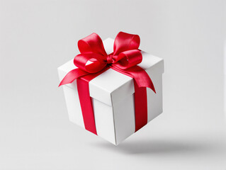 Obraz premium gift box with red ribbon