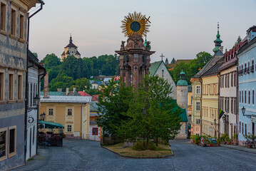 Fototapeta premium Sunrise view of the holy trinity square in Banska Stiavnica, Slo