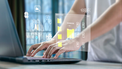 A person using a laptop interacts with a holographic interface showing AI icons and a document management system, illustrating futuristic technology for organizing data.