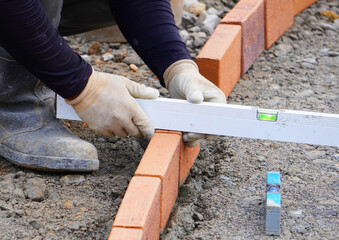 Brick Exterior Construction Work（レンガを使った外構工事の作業風景）