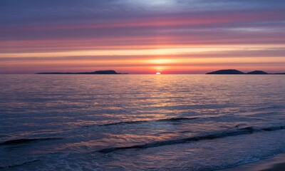 Sunset over tranquil ocean