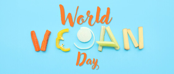 Word VEGAN made of fresh sliced vegetables on color background