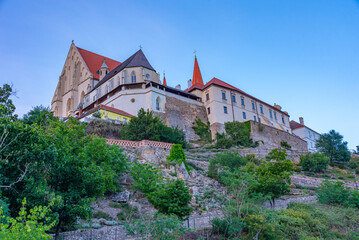 Fototapeta premium Sunset view of Saint Nicholas church and Saint Wenceslas chapel