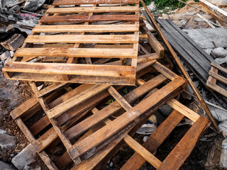 Pile of wooden pallets, ready for recycling or disposal.